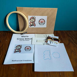 Two pictures showing layouts of workshop kits and the items included.